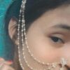 women with triple nose ring chain