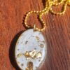 Gilded Elegance: Natural Grey Oval Resin Pendant with Golden Flakes 4 SG RSA CRTJWL 02 1